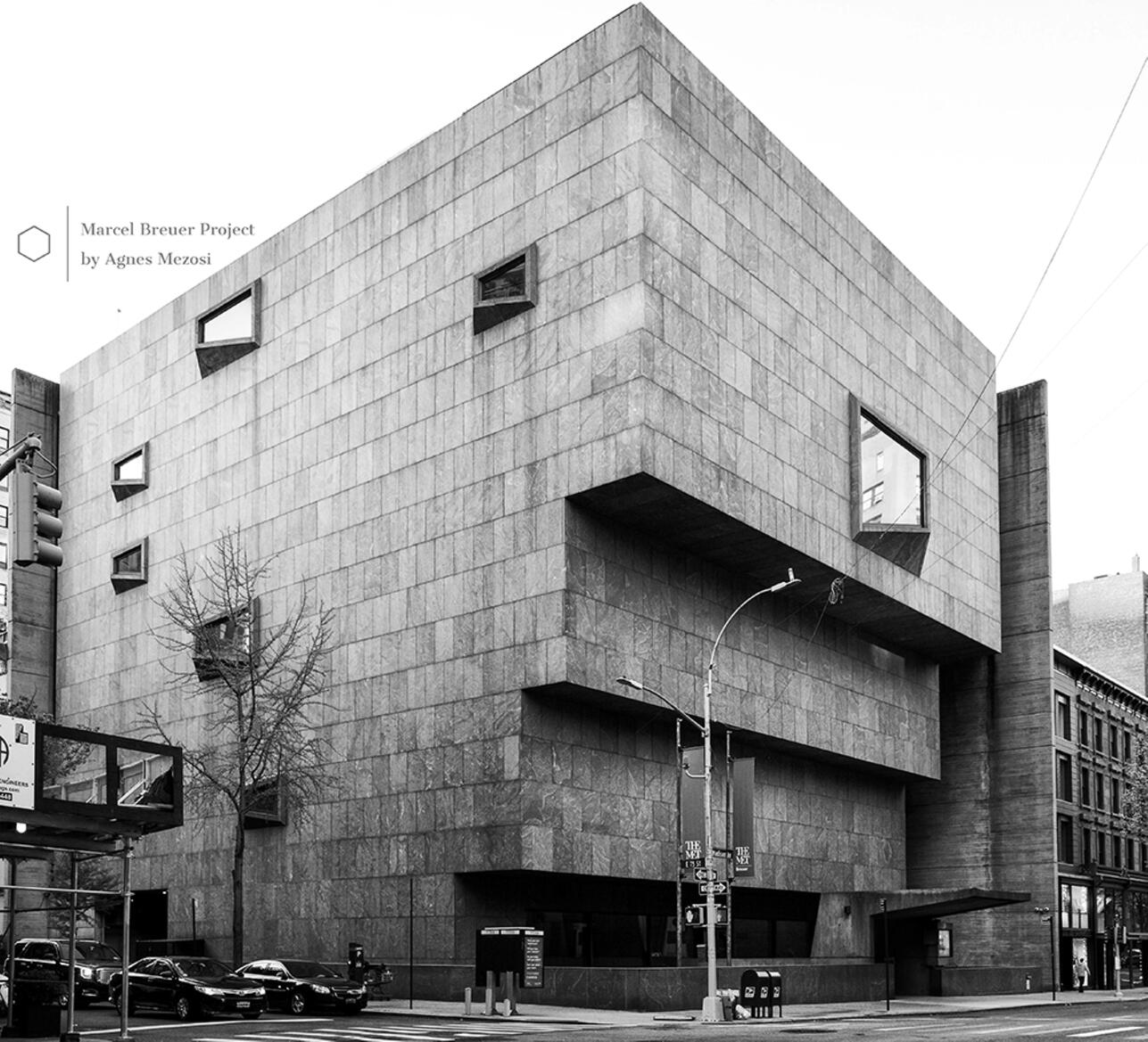 Exterior view of the Whitney Museum building showing its tiered, cantilevered concrete structure from the street.