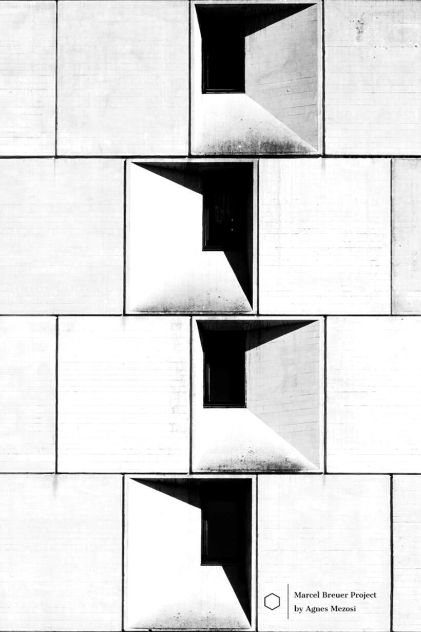 A black and white architectural close-up of the Flaine building facade, showing repeating recessed window units that create sharp light and shadow effects on the concrete surface.