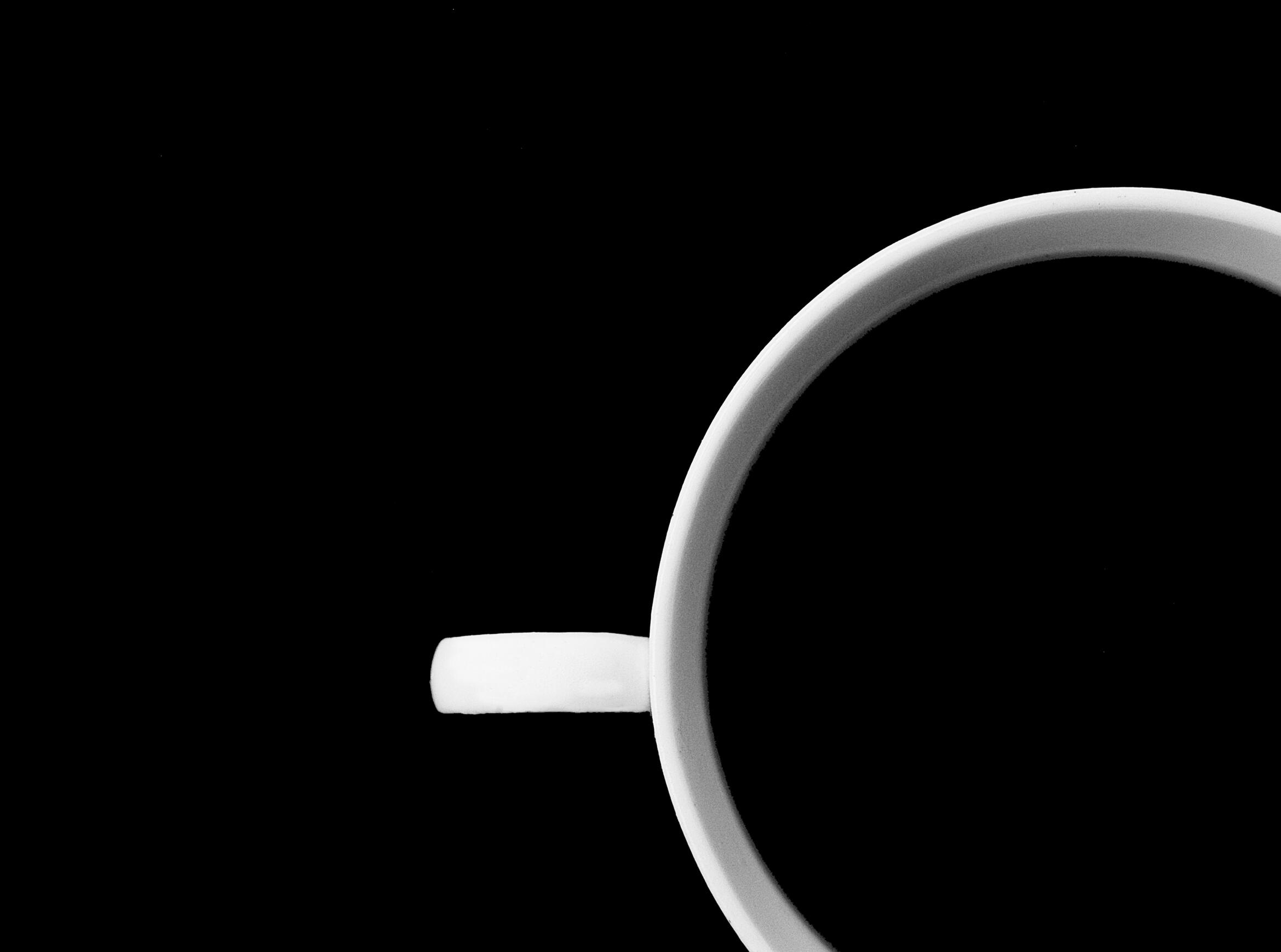 white coffe cup on blakc background